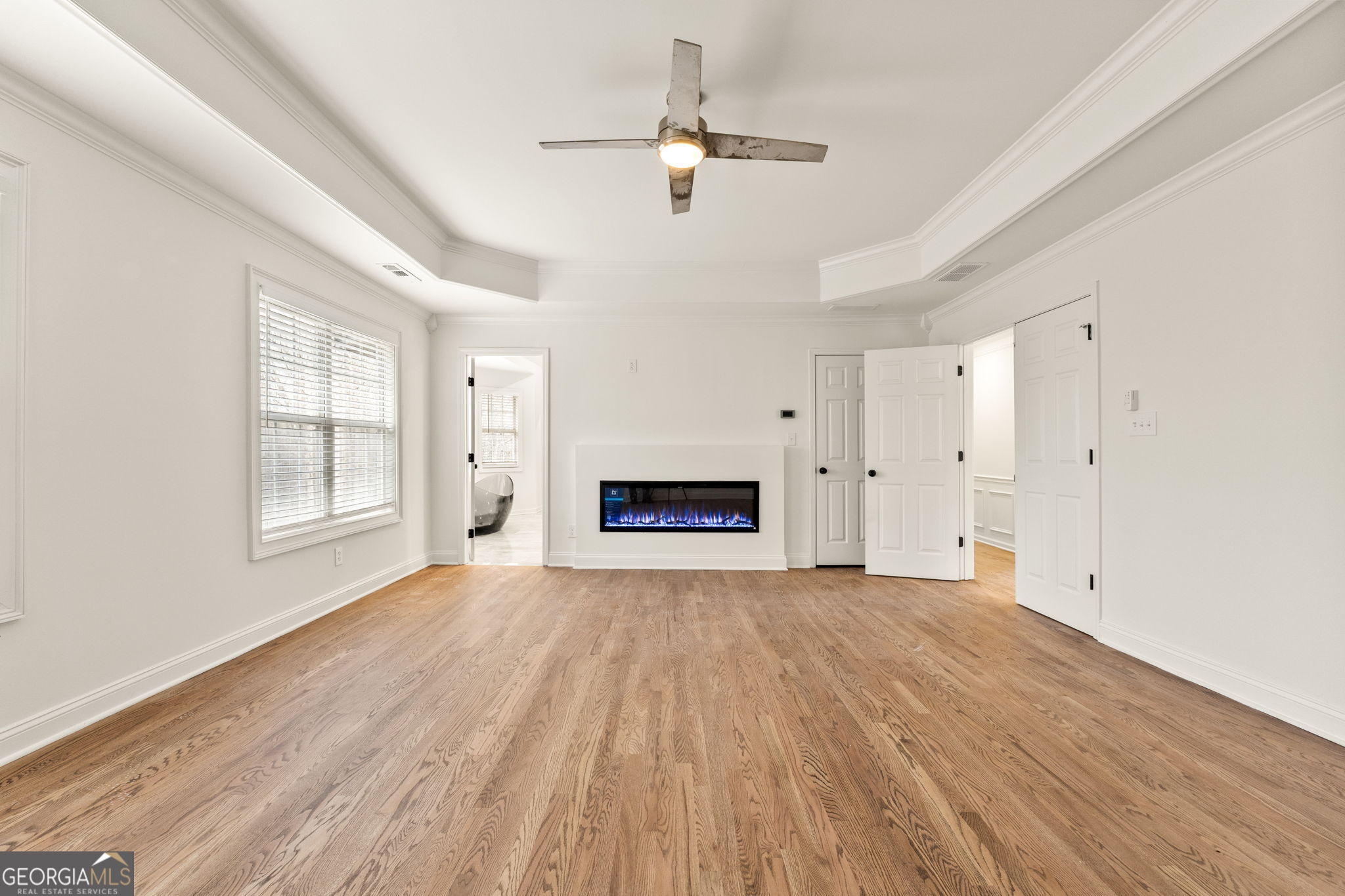 280 Antebellum Way Fayetteville, GA 30215 - Photo 33 of 65 a view of an empty room with a window and fireplace