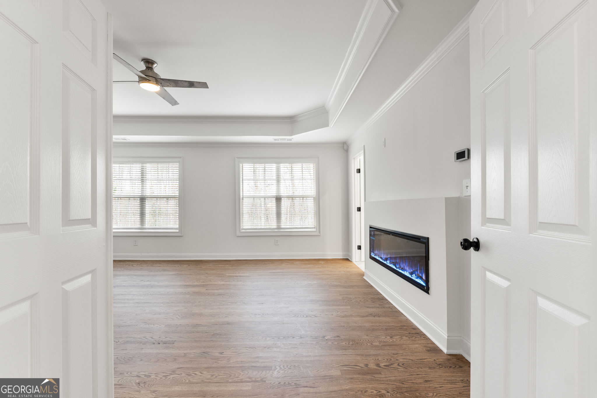 280 Antebellum Way Fayetteville, GA 30215 - Photo 34 of 65 a view of main area fire place window and wooden floor
