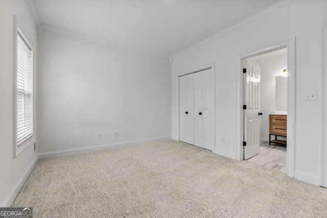 a view of a lake with a yard