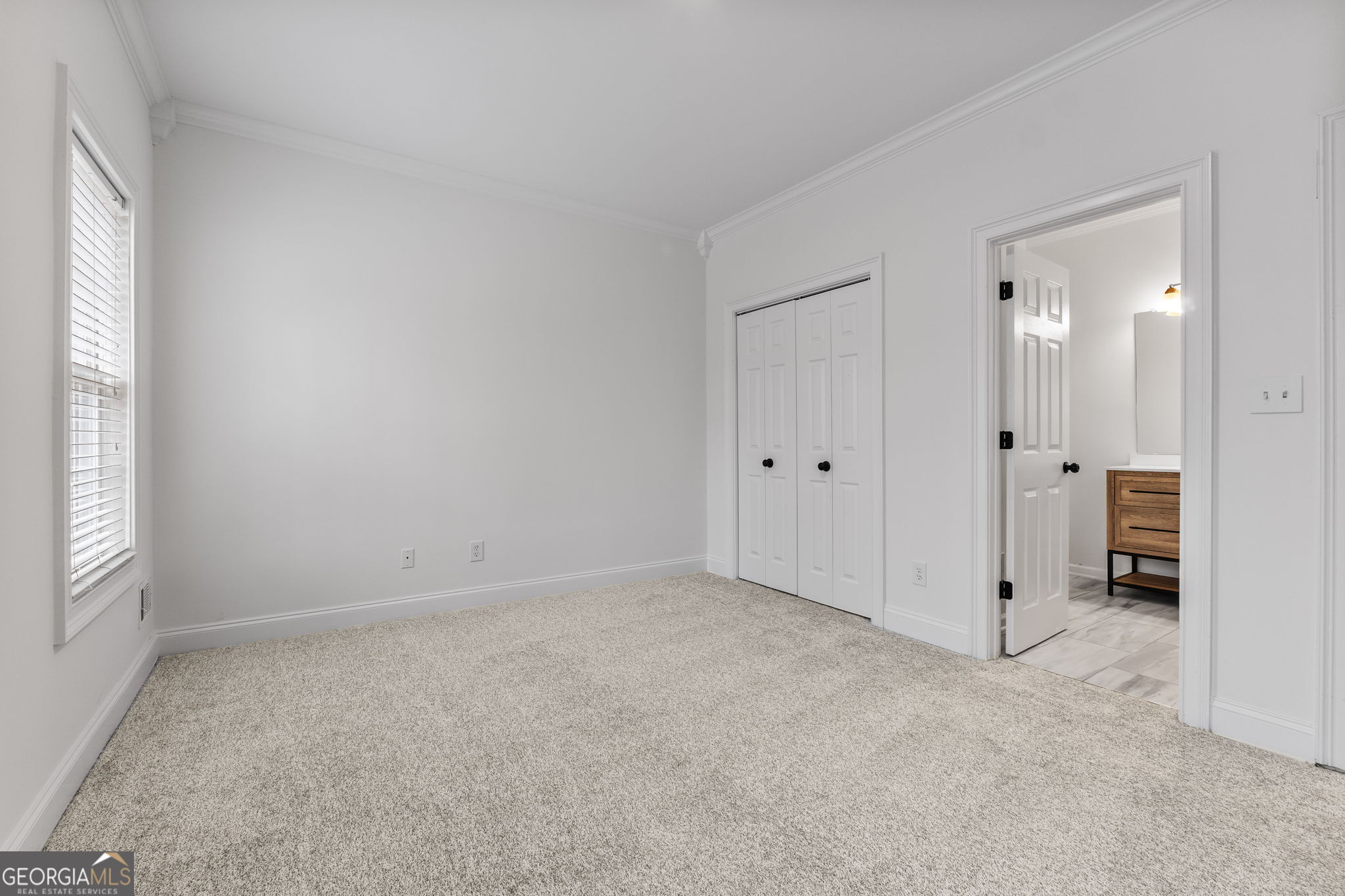 280 Antebellum Way Fayetteville, GA 30215 - Photo 35 of 65 an empty room with a window and a bathroom