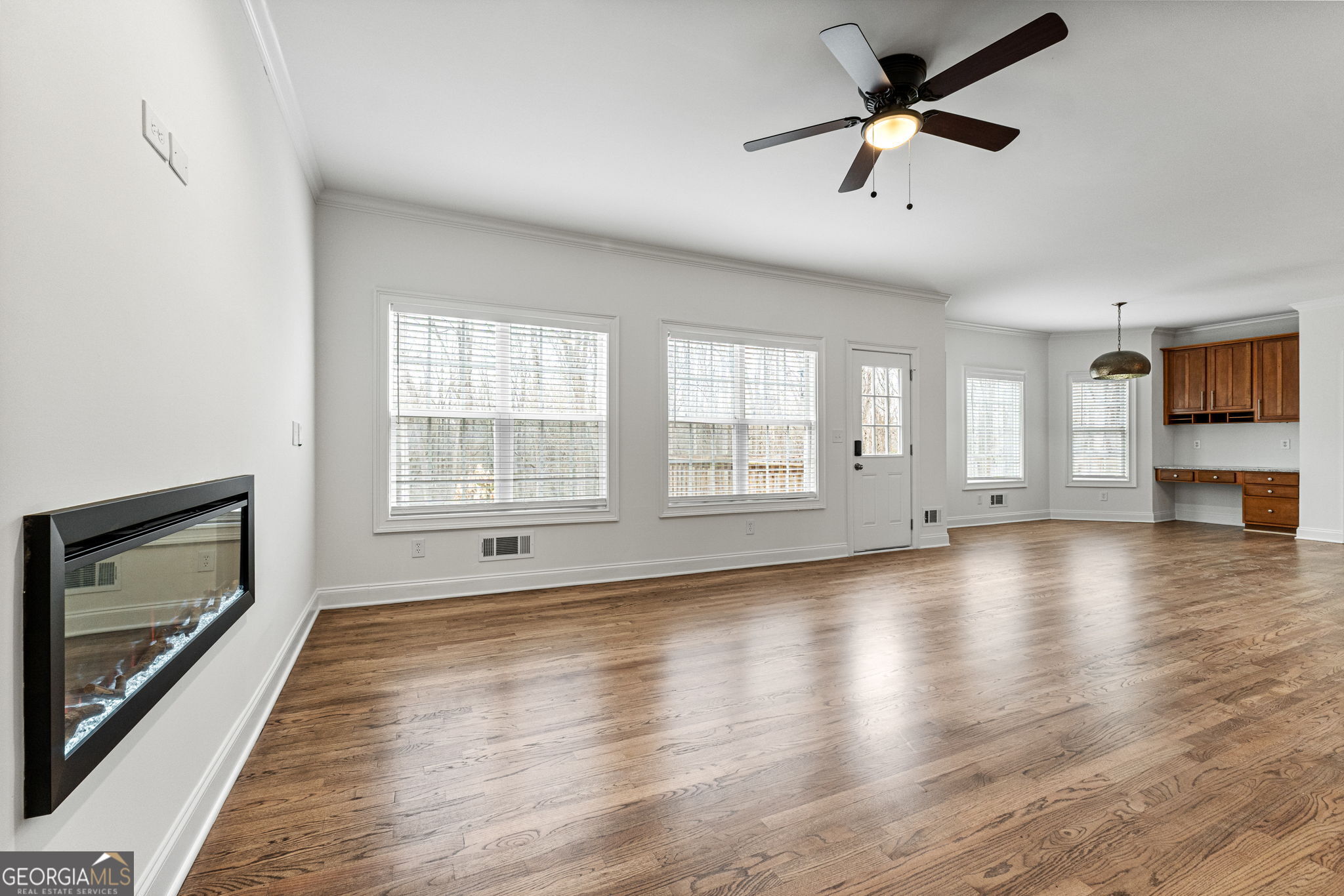 280 Antebellum Way Fayetteville, GA 30215 - Photo 41 of 65 a view of empty room with wooden floor and fireplace