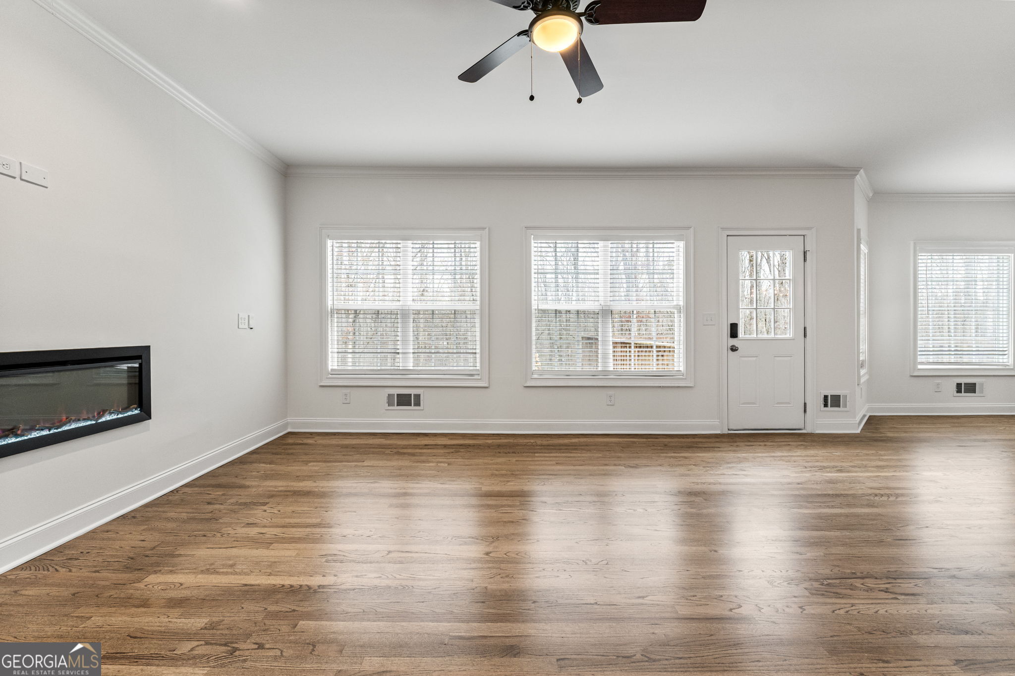 280 Antebellum Way Fayetteville, GA 30215 - Photo 42 of 65 a view of empty room with wooden floor and fan