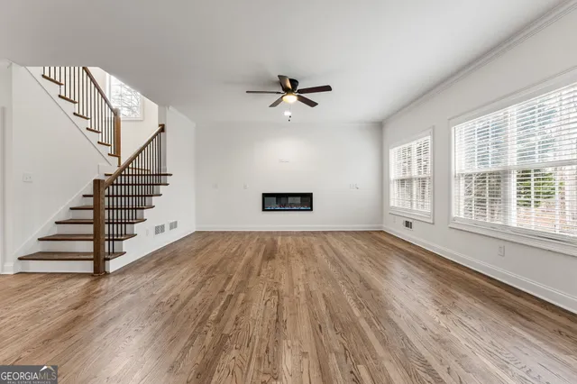 a view of a house with a yard and garage