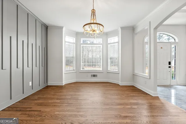 a view of a swimming pool with an outdoor space and seating area