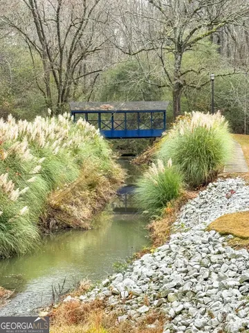 a view of a house with swimming pool