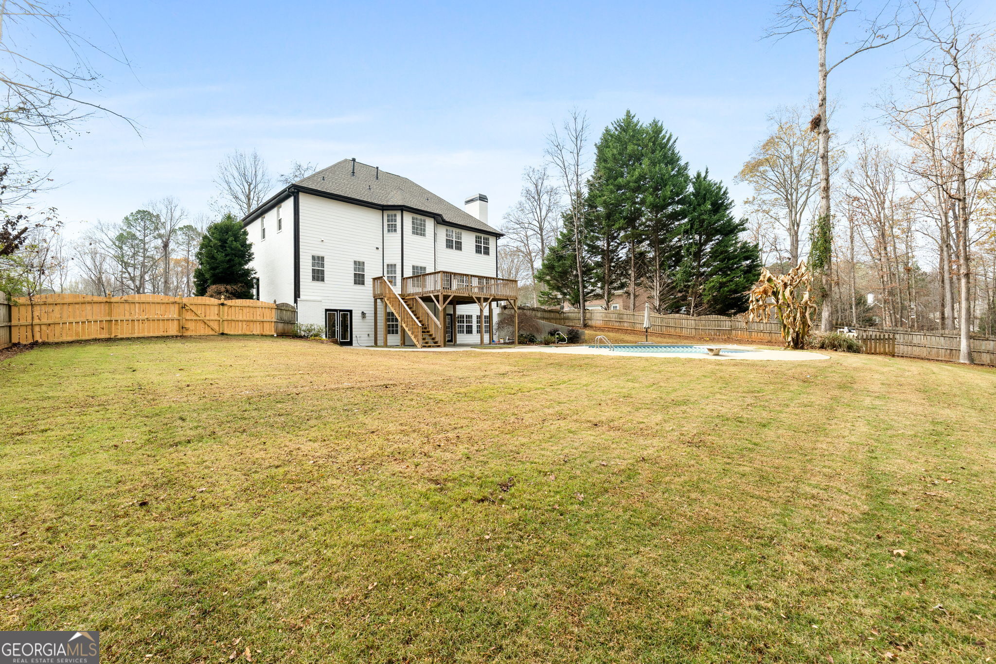 280 Antebellum Way Fayetteville, GA 30215 - Photo 56 of 65 a view of a swimming pool with an outdoor space and seating area