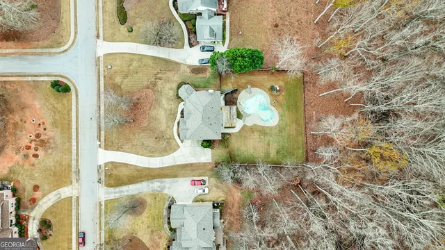 a view of a hallway with entryway wooden floor and front door