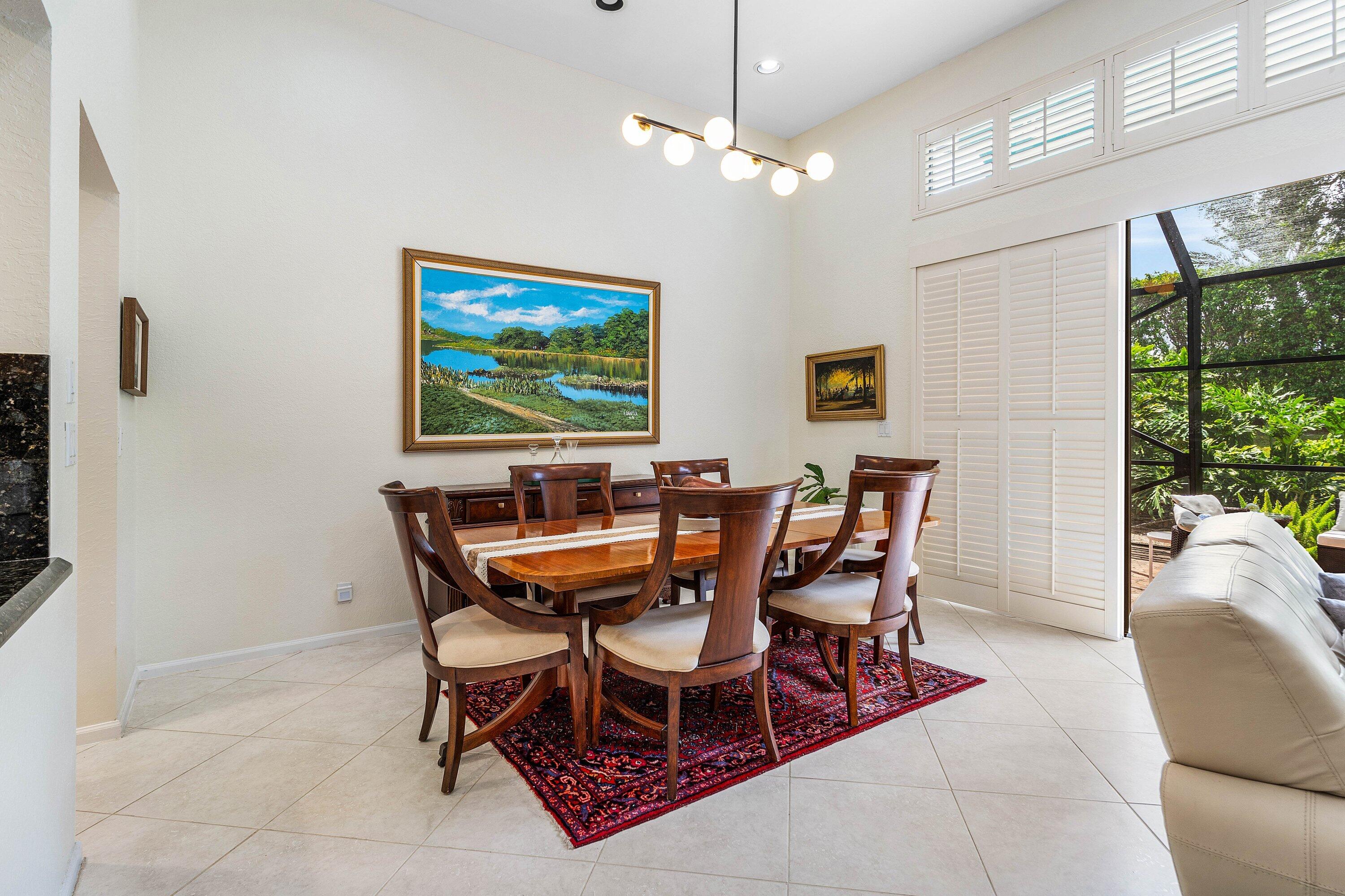 6514 Via Rosa Boca Raton, FL 33433 - Photo 11 of 27 a dining room with furniture and window