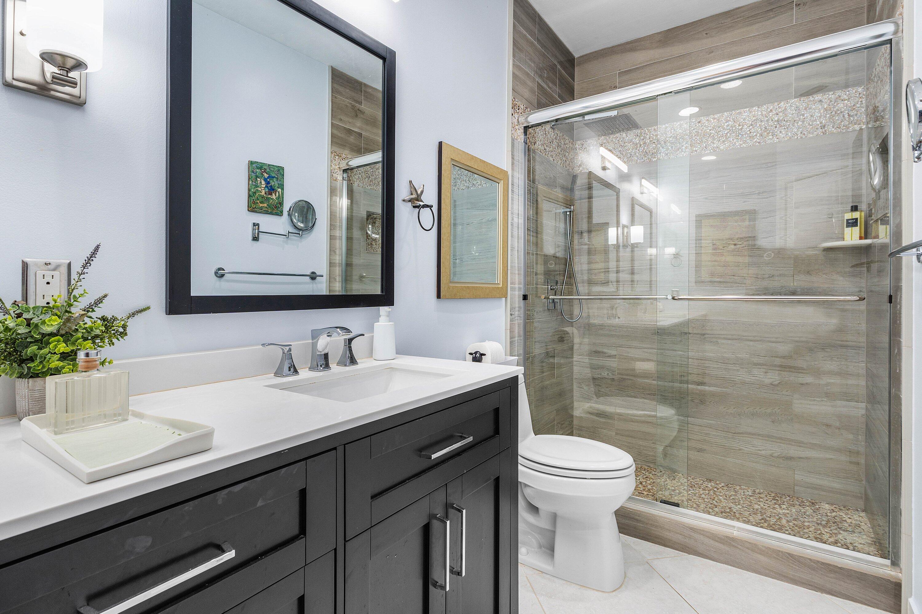 6514 Via Rosa Boca Raton, FL 33433 - Photo 22 of 27 a bathroom with a sink a toilet and shower