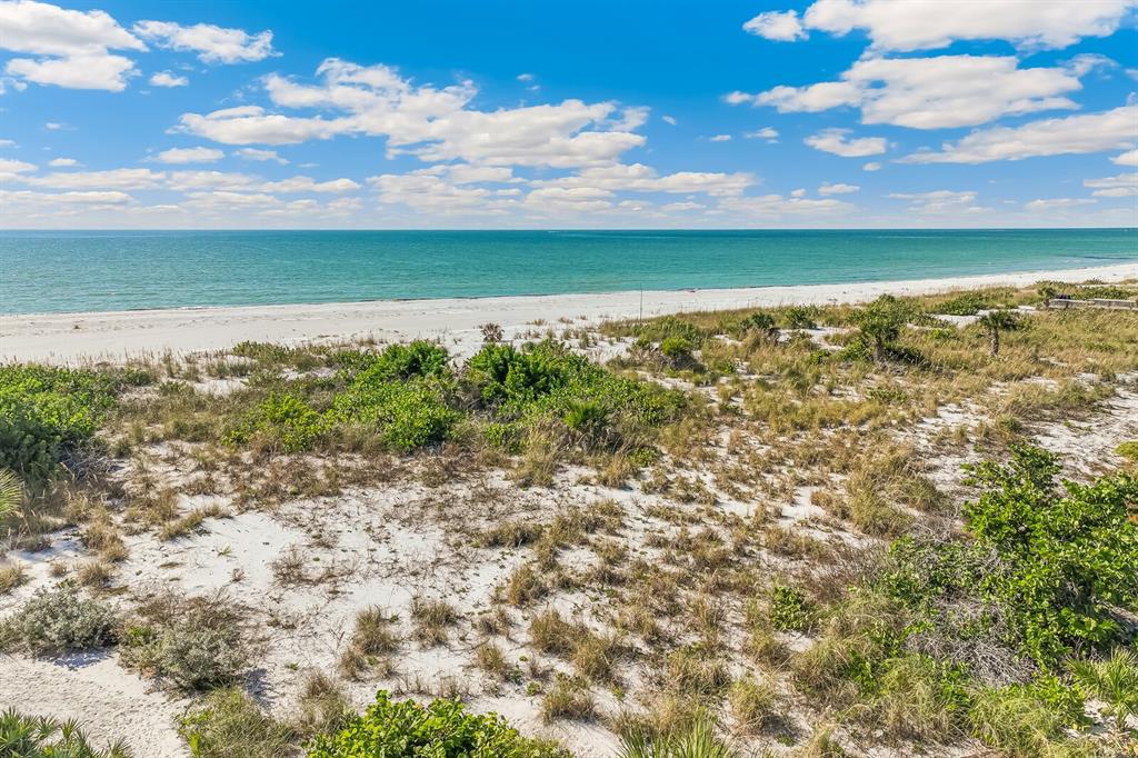 5000 Gasparilla Road, Unit 76B Boca Grande, FL 33921 - Photo 23 of 44 a view of yard with ocean view
