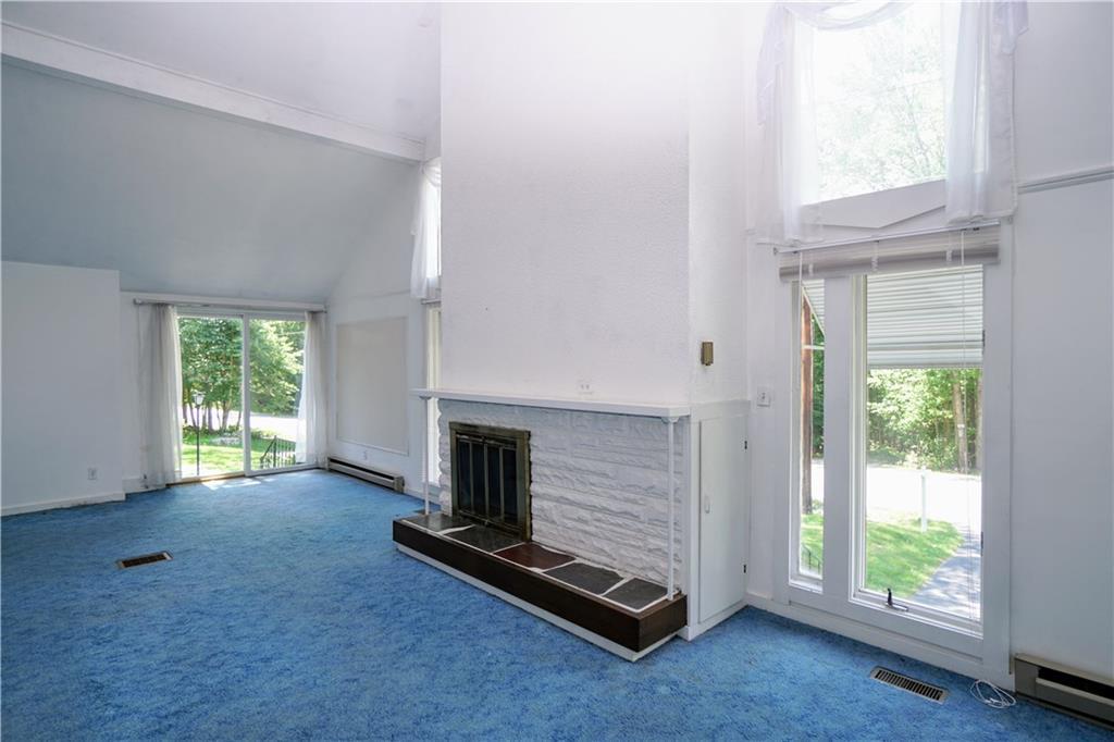 170 Naples Road Harrison, ME 04040 - Photo 10 of 35 Another angle of fireplace in living...