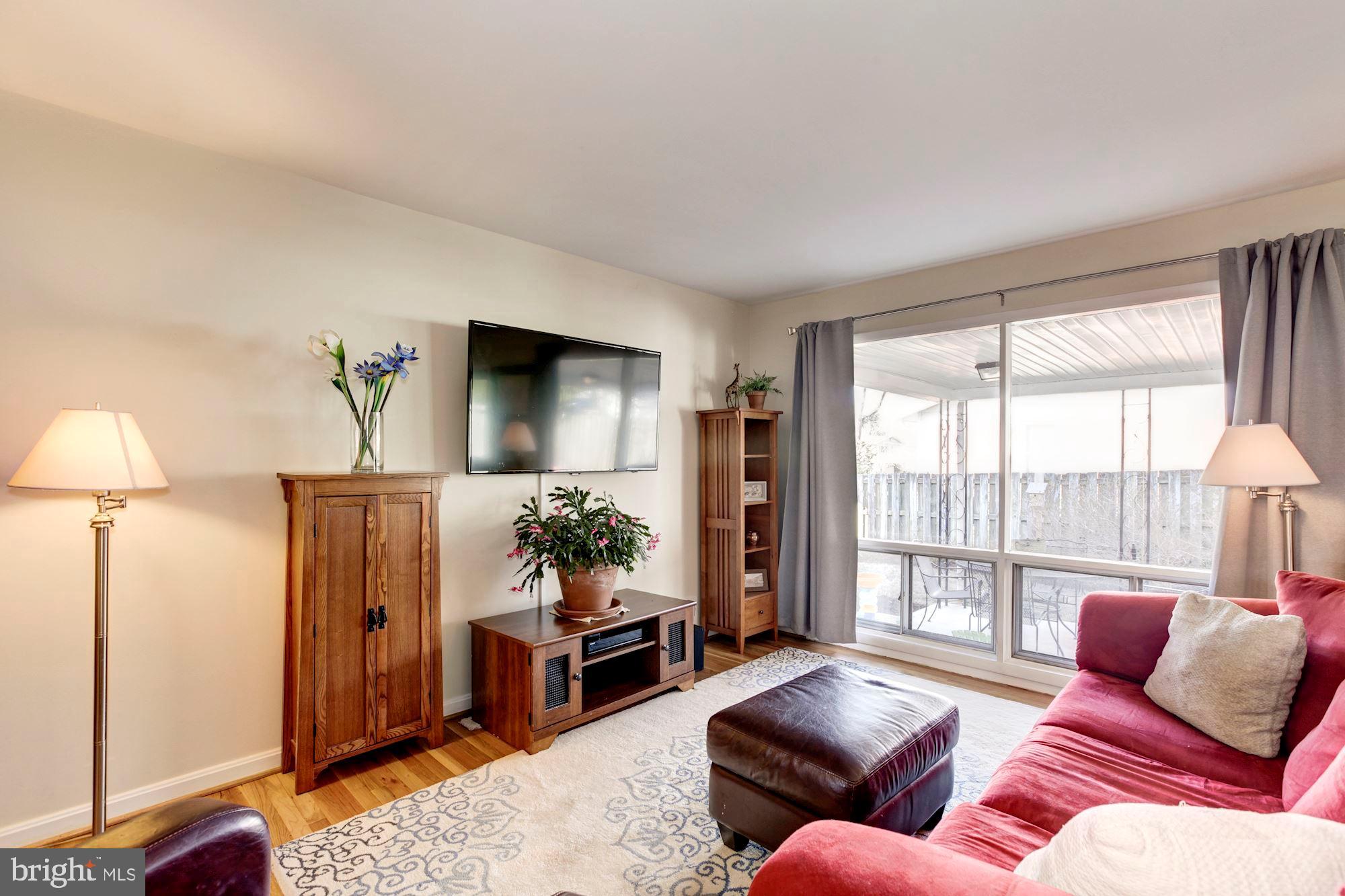 Living area with floor to window ceiling windows