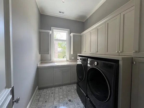 a storage room with washer and dryer