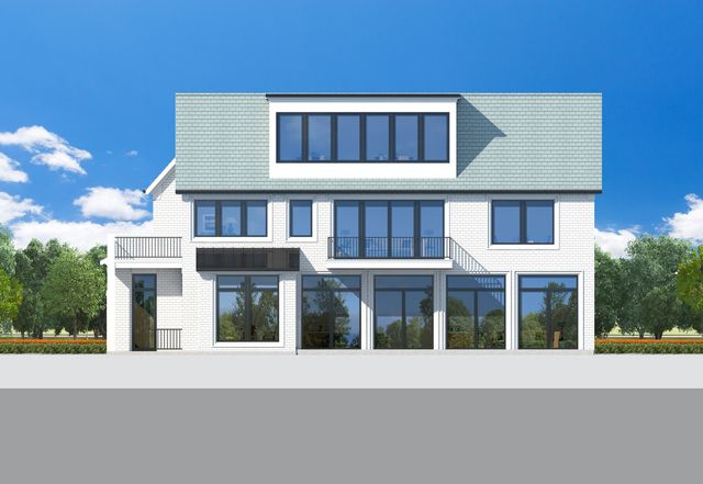 a view of a brick building next to a yard