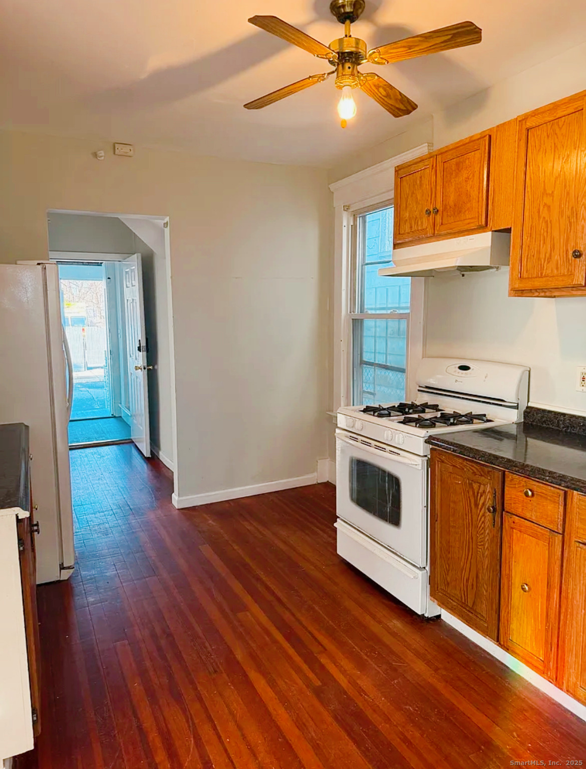 82 1st Street New Haven, CT 06519 - Photo 14 of 40 a kitchen with stainless steel appliances a hardwood floor and a sink
