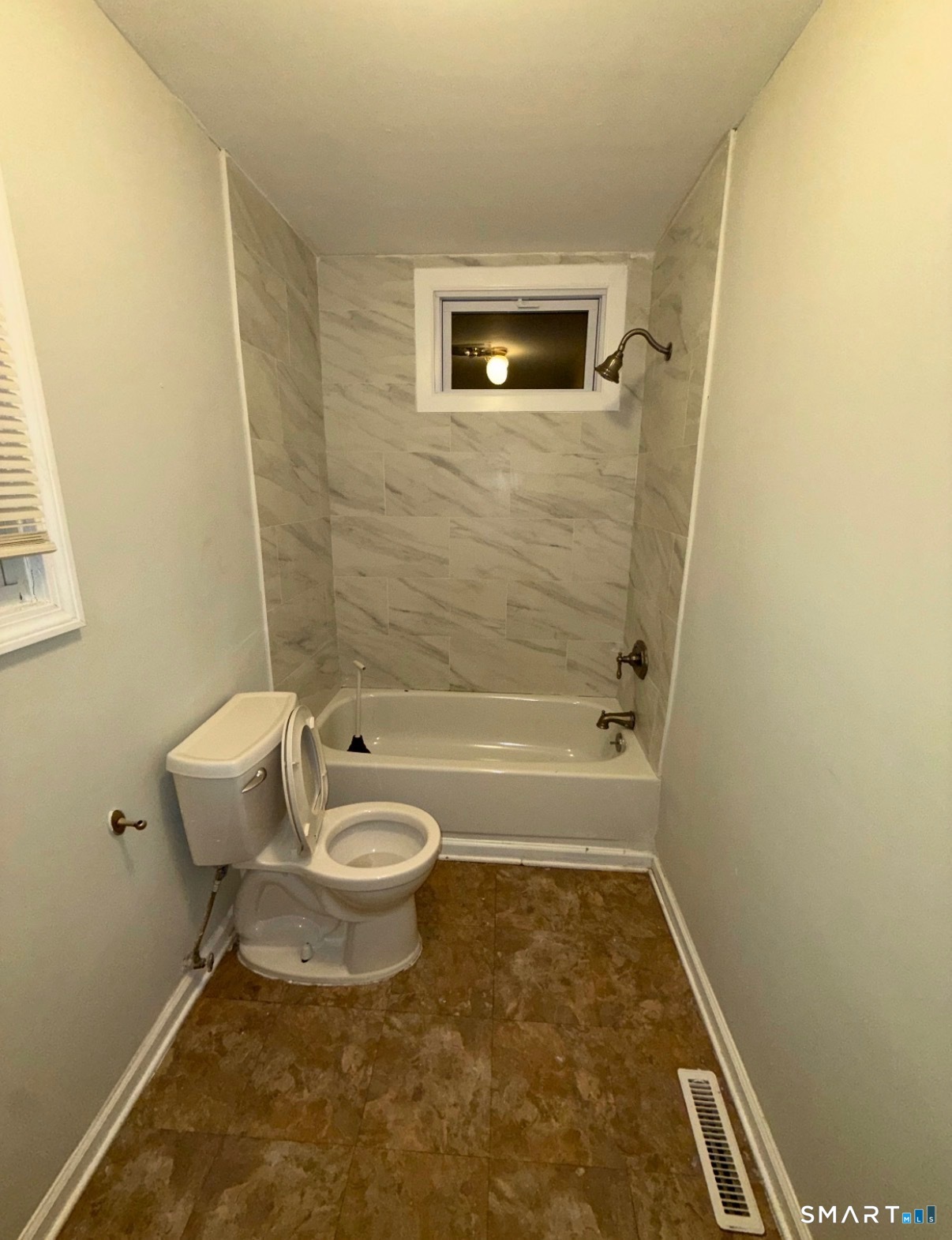 82 1st Street New Haven, CT 06519 - Photo 17 of 40 a bathroom with a sink and a mirror