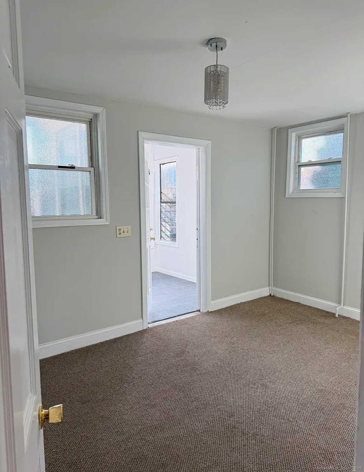 82 1st Street New Haven, CT 06519 - Photo 18 of 40 an empty room with windows