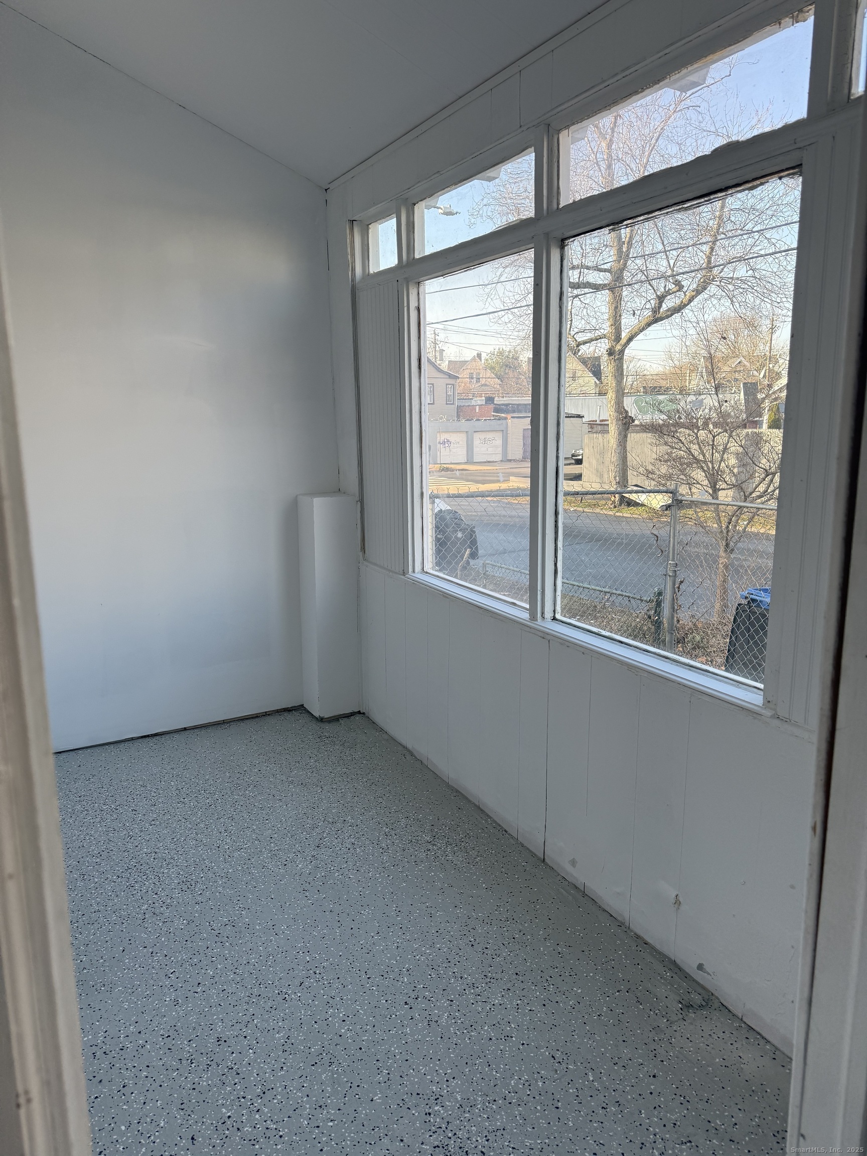 82 1st Street New Haven, CT 06519 - Photo 8 of 40 an empty room with a window