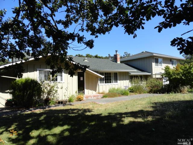 2632 Hidden Acres Road Santa Rosa, CA 95404 - Photo 1 of 1 a front view of a house with a yard