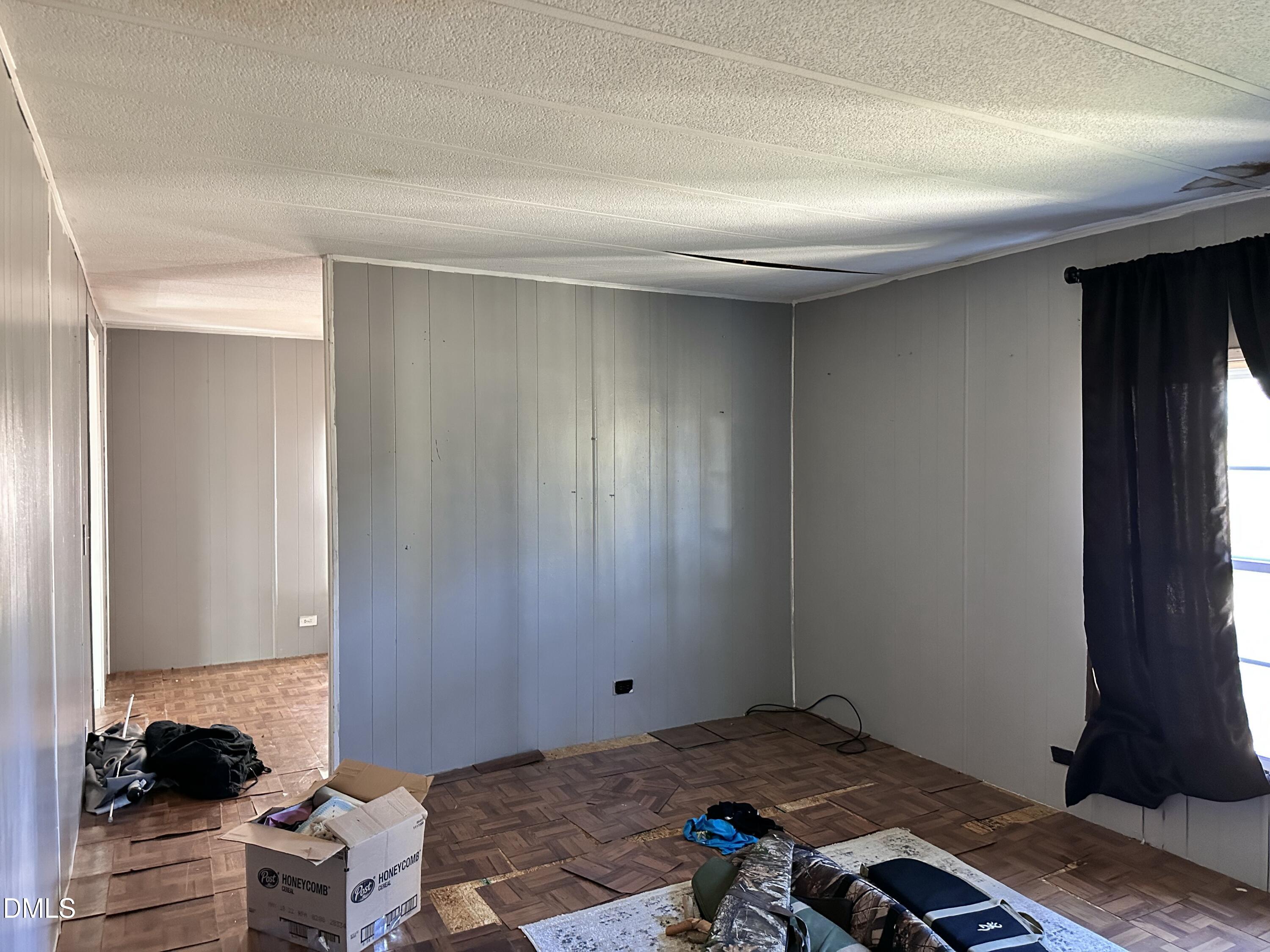 3263 Fleming Graham Road Burlington, NC 27217 - Photo 13 of 15 a bedroom with a bed and a window