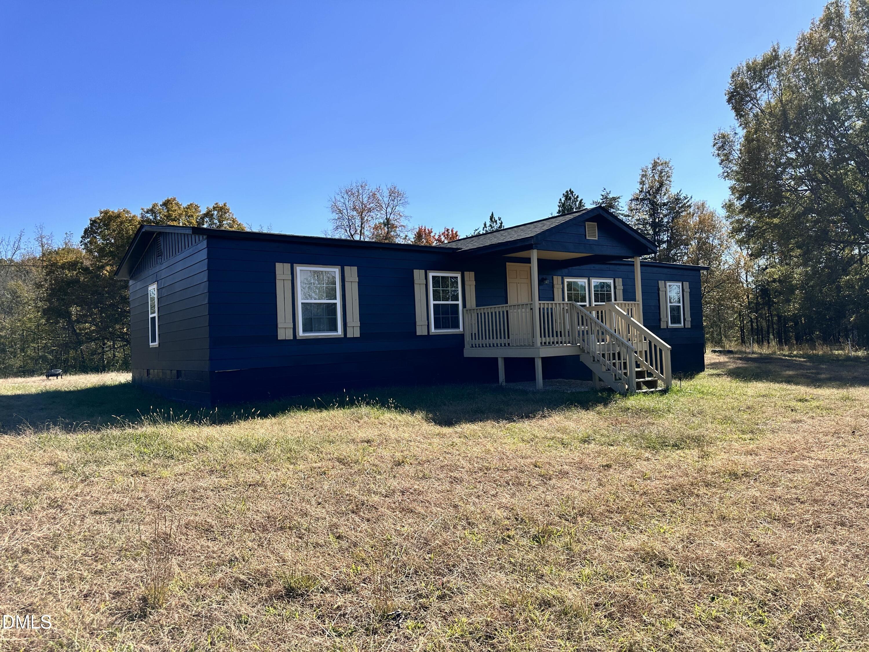 3263 Fleming Graham Road Burlington, NC 27217 - Photo 2 of 15 a view of a house with a yard
