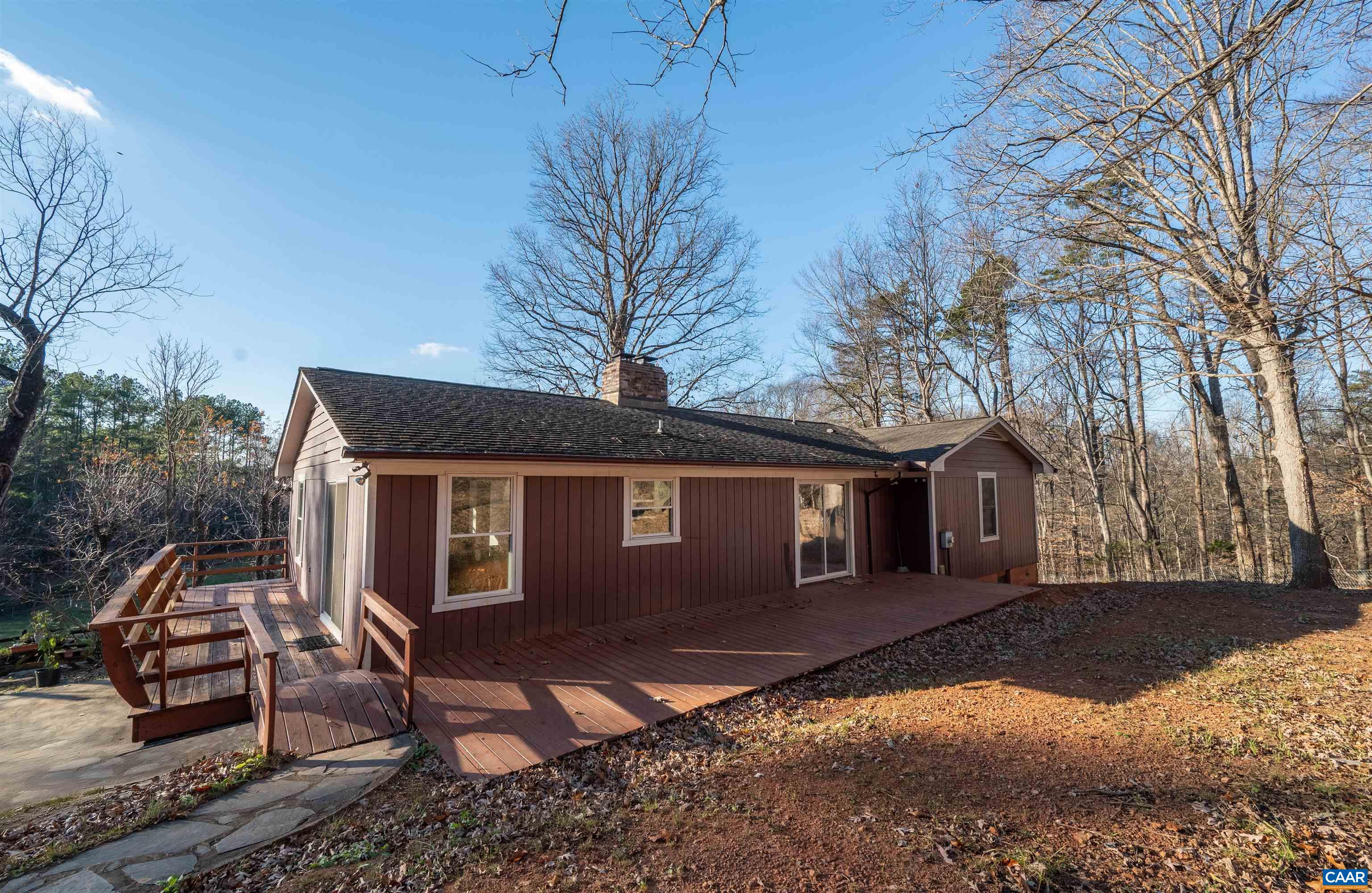 3139 Stony Point Road Charlottesville, VA 22911 - Photo 41 of 50 a front view of house with yard and trees in the background