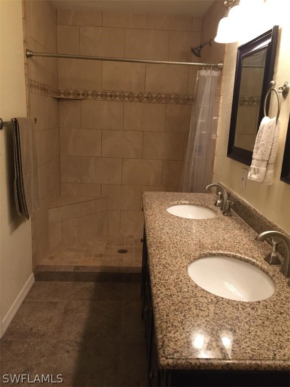 3031 Packinghouse Road Alva, FL 33920 - Photo 17 of 24 a bathroom with a sink and a mirror