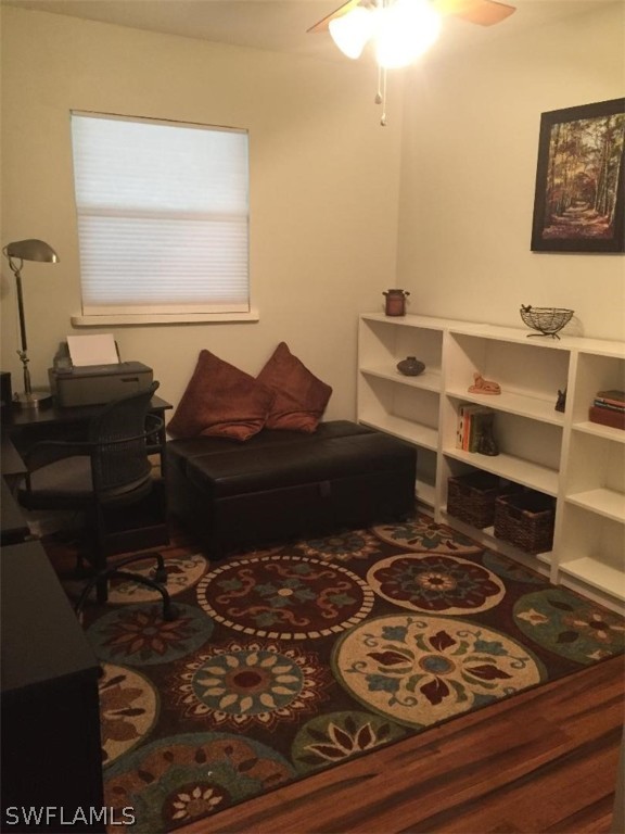 3031 Packinghouse Road Alva, FL 33920 - Photo 20 of 24 a living room with a couch and a stove next to a window