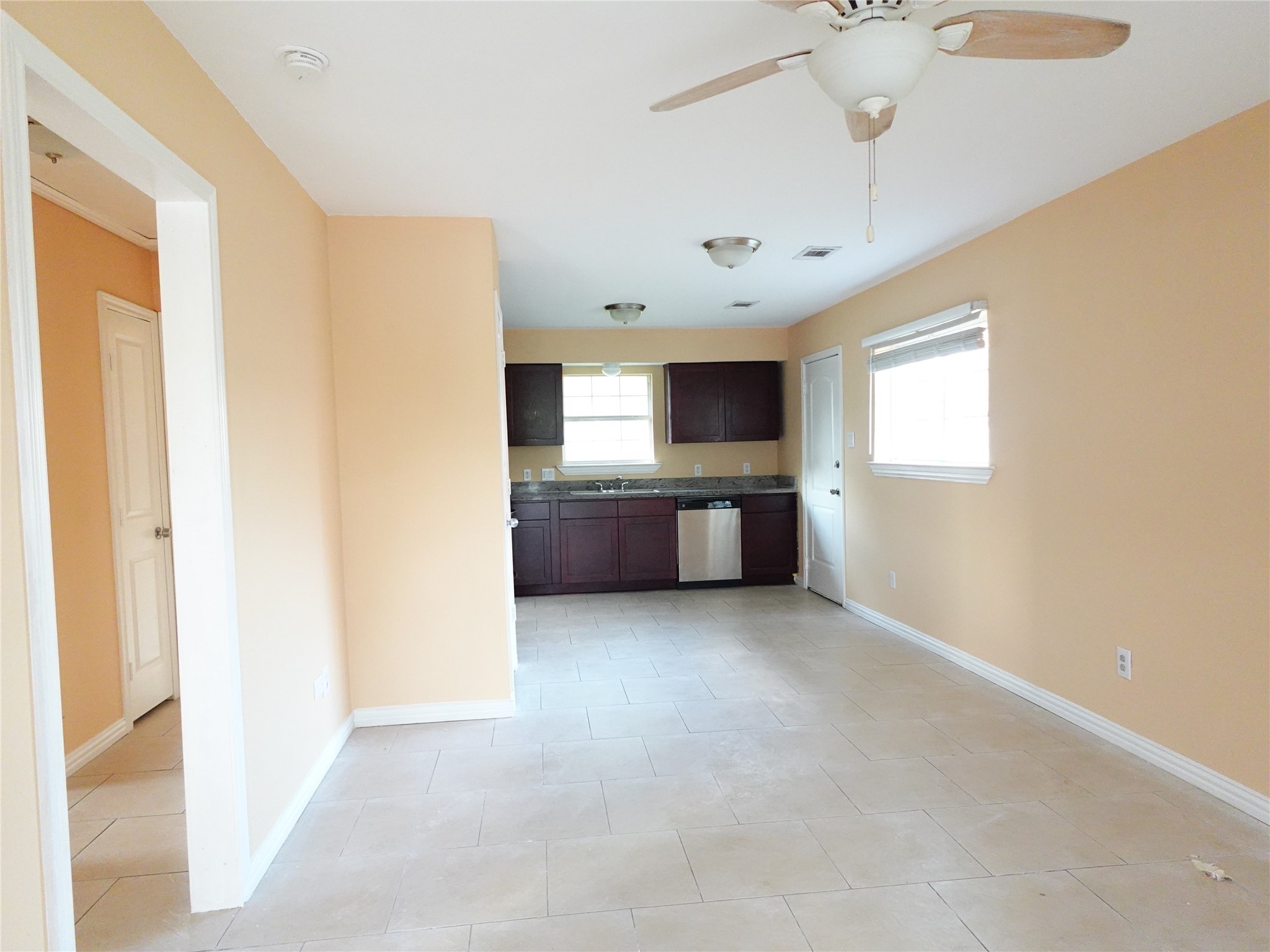 4721 Denmark Street Houston, TX 77016 - Photo 4 of 6 a view of a kitchen with a sink and dishwasher kitchen view