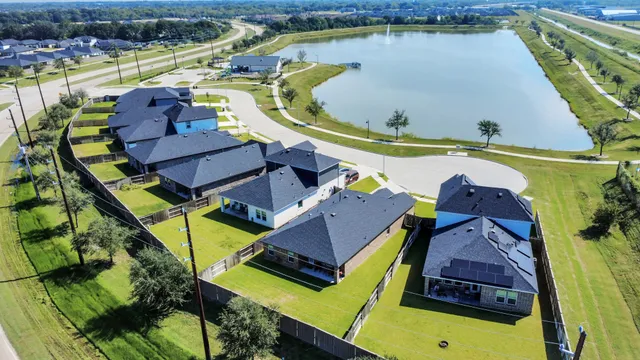 a view of a lake with a yard