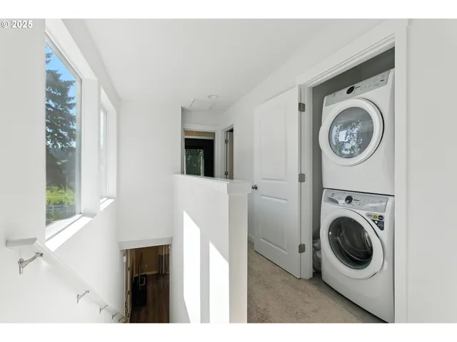 a view of washer and dryer in a utility room