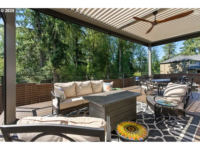 a view of a patio with couches chairs and a table and chairs