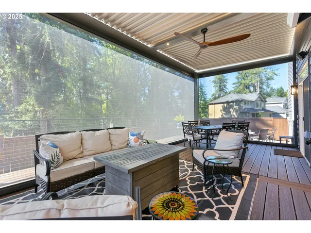 a outdoor living space with furniture and wooden floor