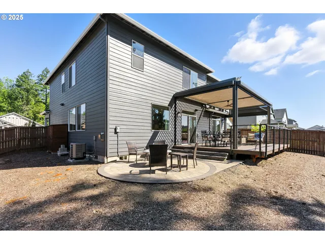 a view of the house with outdoor kitchen