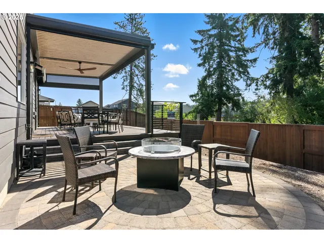 a view of a chairs and tables in the patio