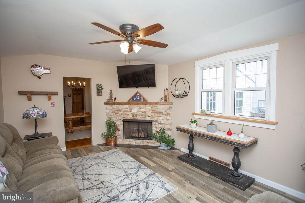 406 Walnut Avenue Laurel Springs, NJ 08021 - Photo 13 of 20 a living room with furniture and a fireplace