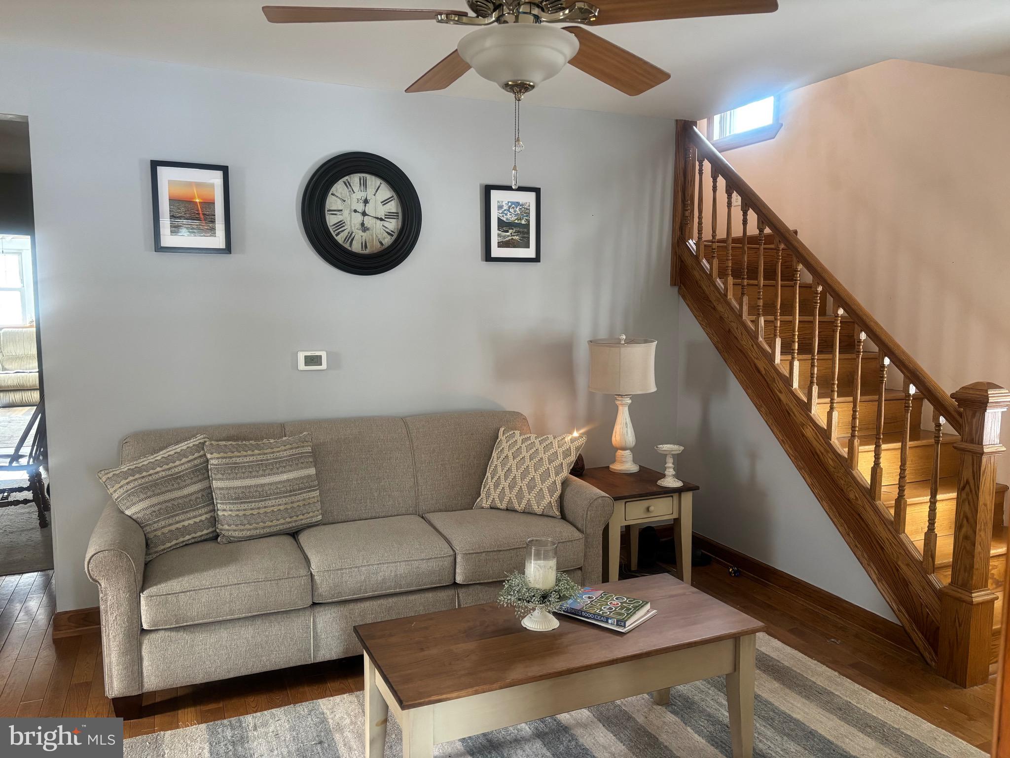 406 Walnut Avenue Laurel Springs, NJ 08021 - Photo 6 of 20 a living room with furniture and a wall painting