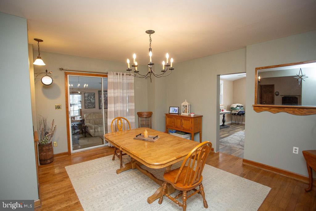 406 Walnut Avenue Laurel Springs, NJ 08021 - Photo 8 of 20 a living room with furniture and a chandelier
