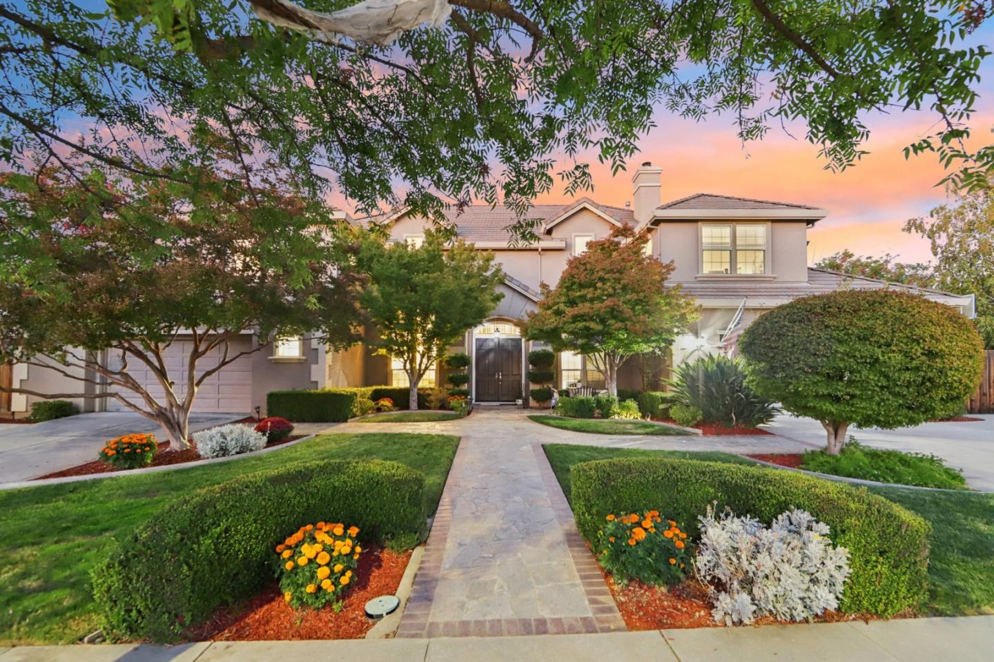 2276 Bentley Ridge Drive San Jose, CA 95138 - Photo 1 of 55 a front view of a house with a yard and garage
