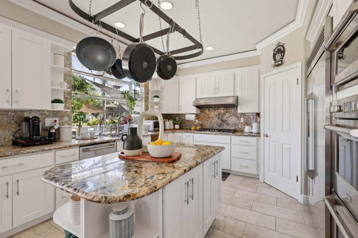 2276 Bentley Ridge Drive San Jose, CA 95138 - Photo 11 of 55 a kitchen with stainless steel appliances granite countertop a sink a stove and cabinets