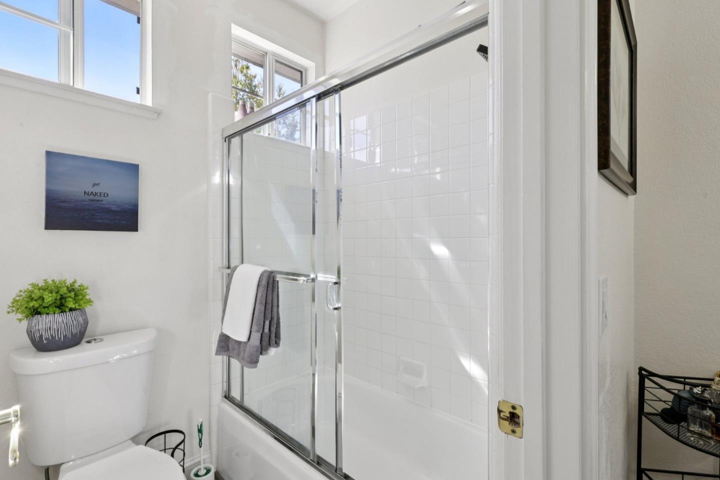 2276 Bentley Ridge Drive San Jose, CA 95138 - Photo 36 of 55 a bathroom with a shower and a toilet