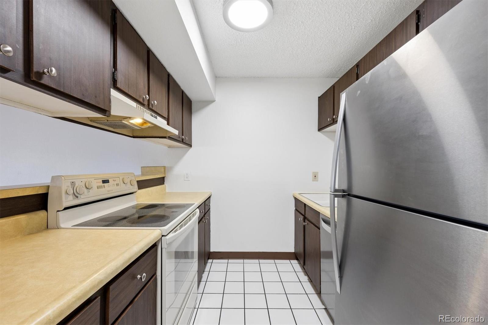 2707 Valmont Road, Unit 312D Boulder, CO 80304 - Photo 11 of 48 a utility room with dryer and washer