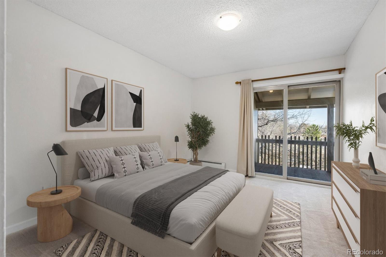2707 Valmont Road, Unit 312D Boulder, CO 80304 - Photo 16 of 48 a bedroom with a bed and a window