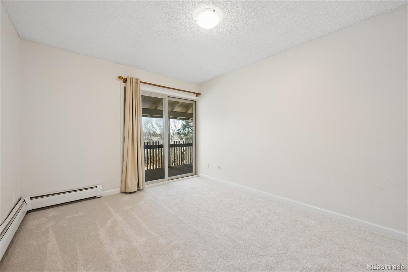 2707 Valmont Road, Unit 312D Boulder, CO 80304 - Photo 20 of 48 a view of an empty room with a window