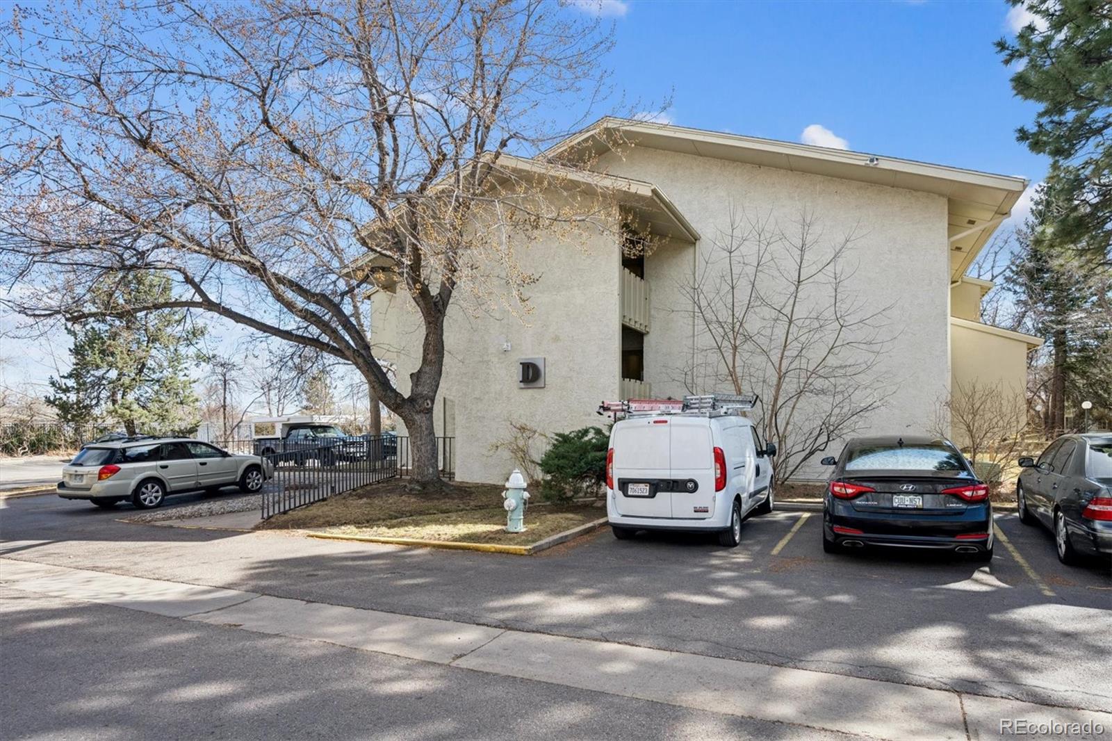 2707 Valmont Road, Unit 312D Boulder, CO 80304 - Photo 30 of 48 a view of a cars parked in front of a house