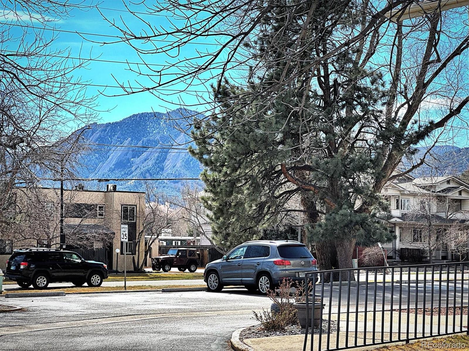 2707 Valmont Road, Unit 312D Boulder, CO 80304 - Photo 34 of 48 a cars parked on the side of a street