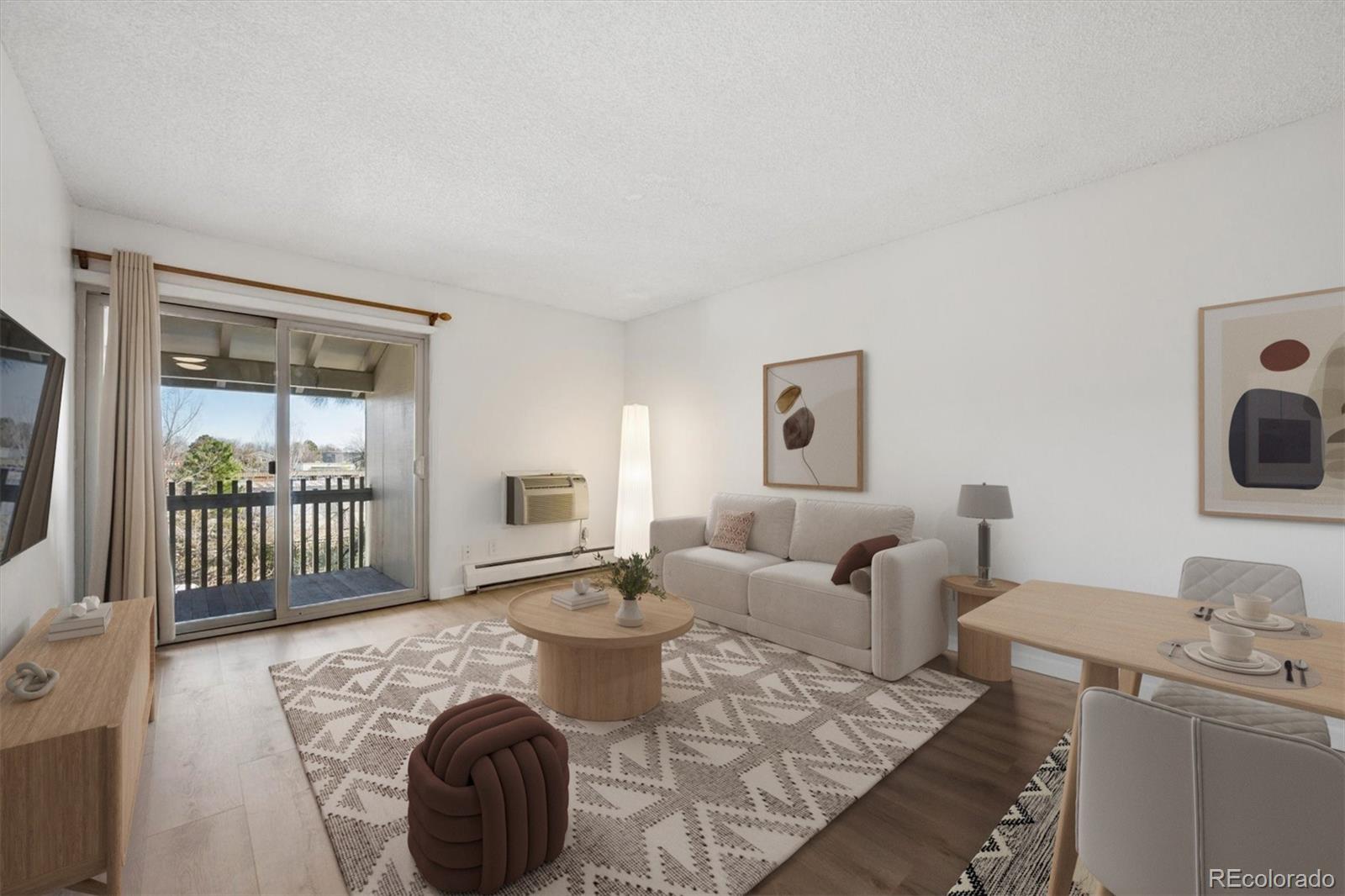 2707 Valmont Road, Unit 312D Boulder, CO 80304 - Photo 4 of 48 a living room with furniture and a flat screen tv