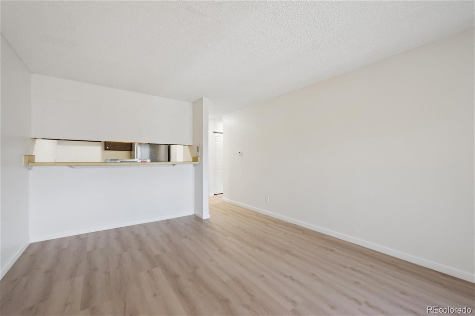 2707 Valmont Road, Unit 312D Boulder, CO 80304 - Photo 9 of 48 a view of empty room with wooden floor