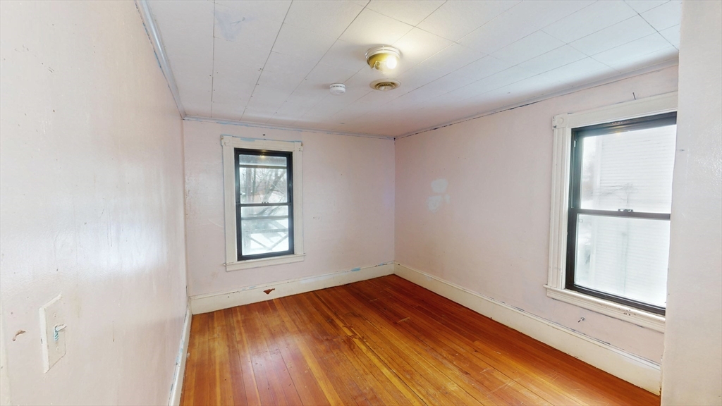 1403 Worcester Street Springfield, MA 01151 - Photo 12 of 23 an empty room with windows