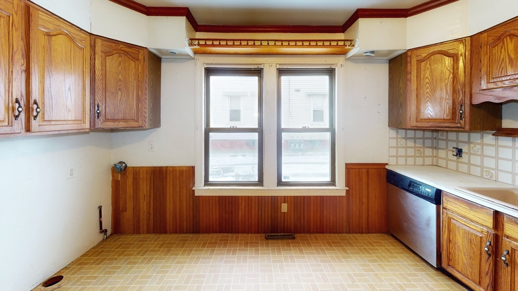 1403 Worcester Street Springfield, MA 01151 - Photo 5 of 23 a view of an empty room with a window